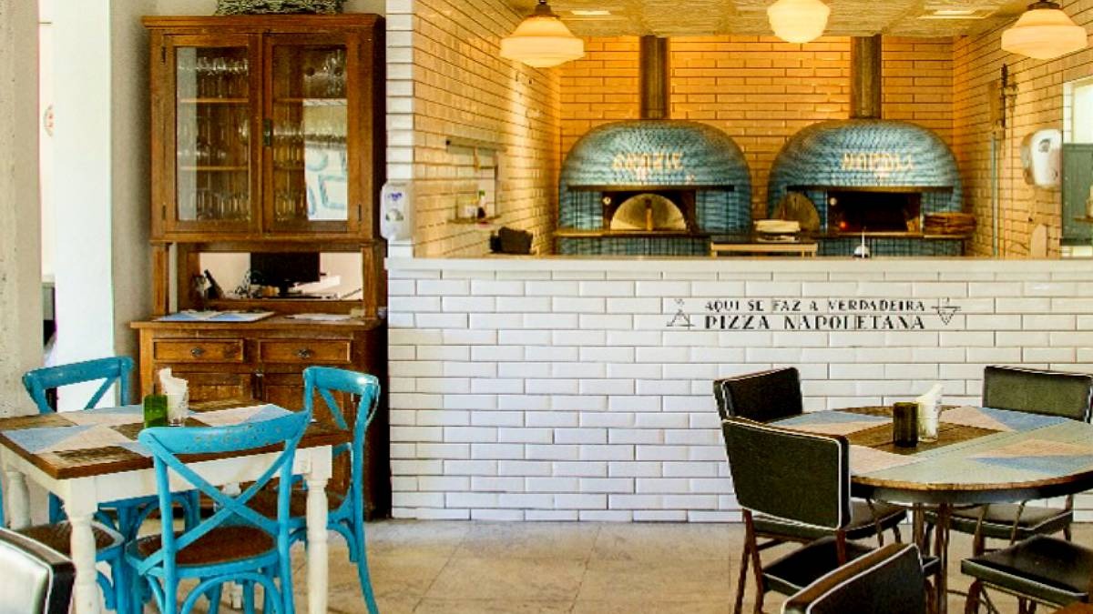 Lema escrito nas paredes da casa: 'aqui se faz a verdadeira pizza napoletana'/Divulgação/Instagram
