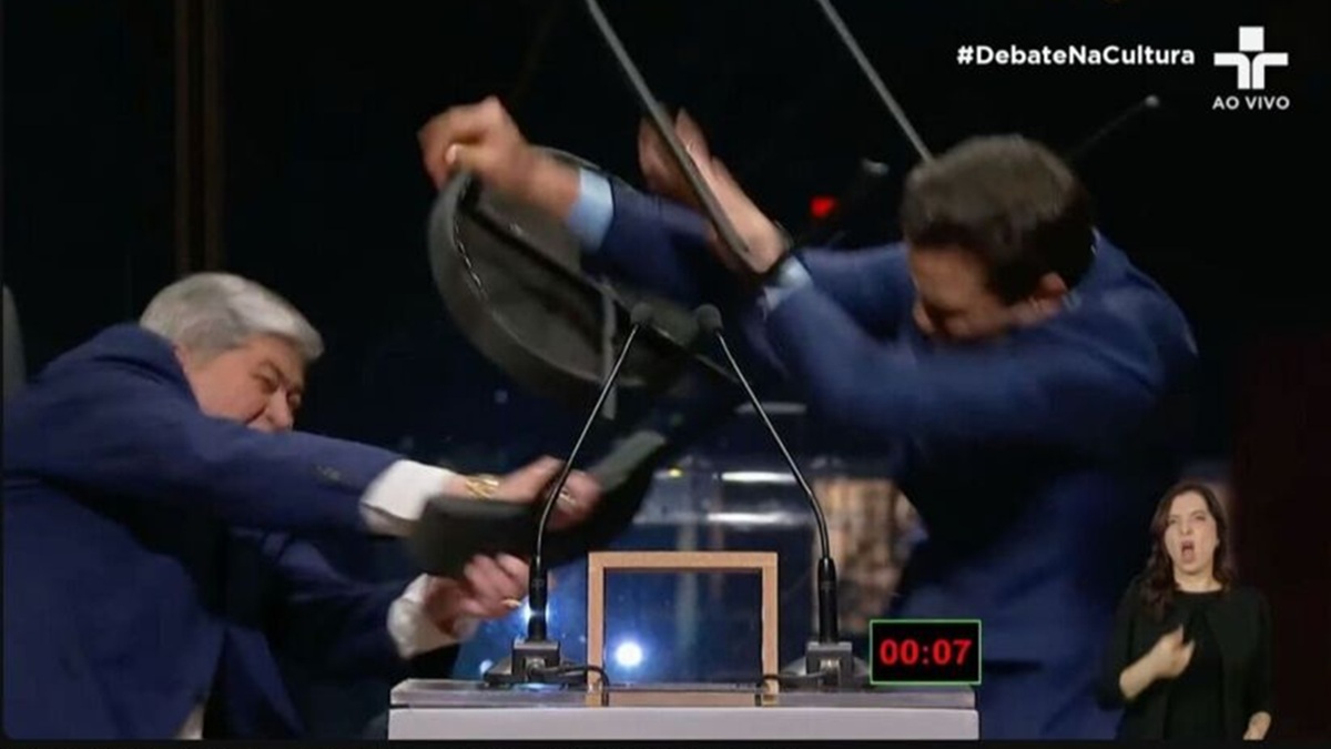 Candidato levou uma cadeirada de Datena durante debate na TV Cultura/Reprodução