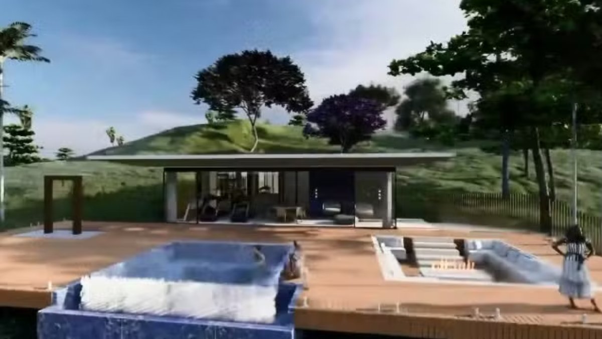 A residência foi construída em um terreno com diferentes níveis, e uma grande escada faz a ligação entre os espaços internos