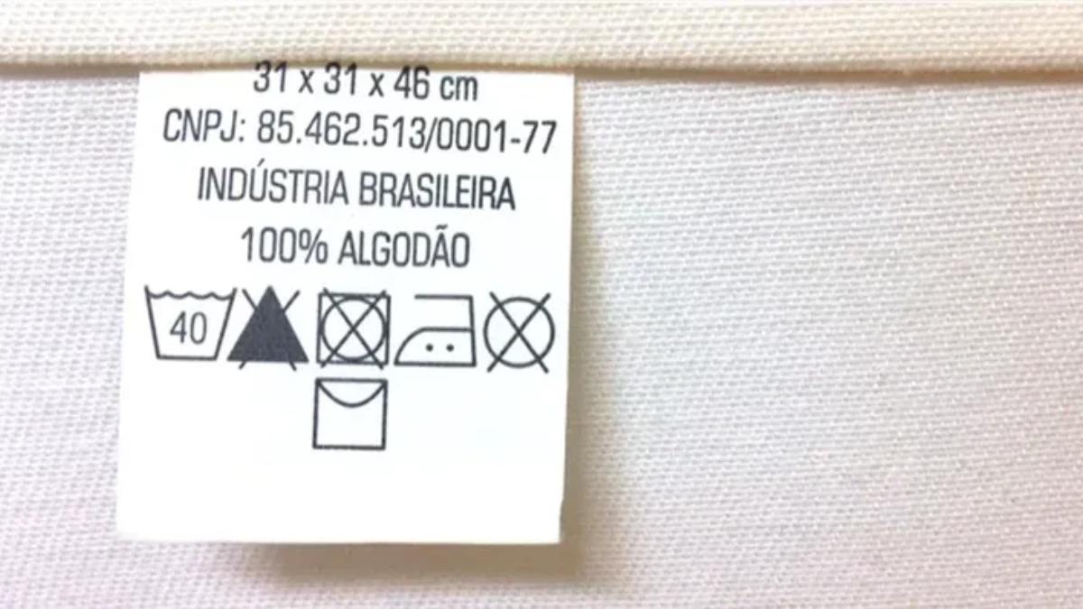 O quadrado dita as regras da secagem, mostrando se a roupa suporta secadora, se deve ser estendida no varal ou se precisa secar à sombra para não desbotar. Foto: Divulgação
