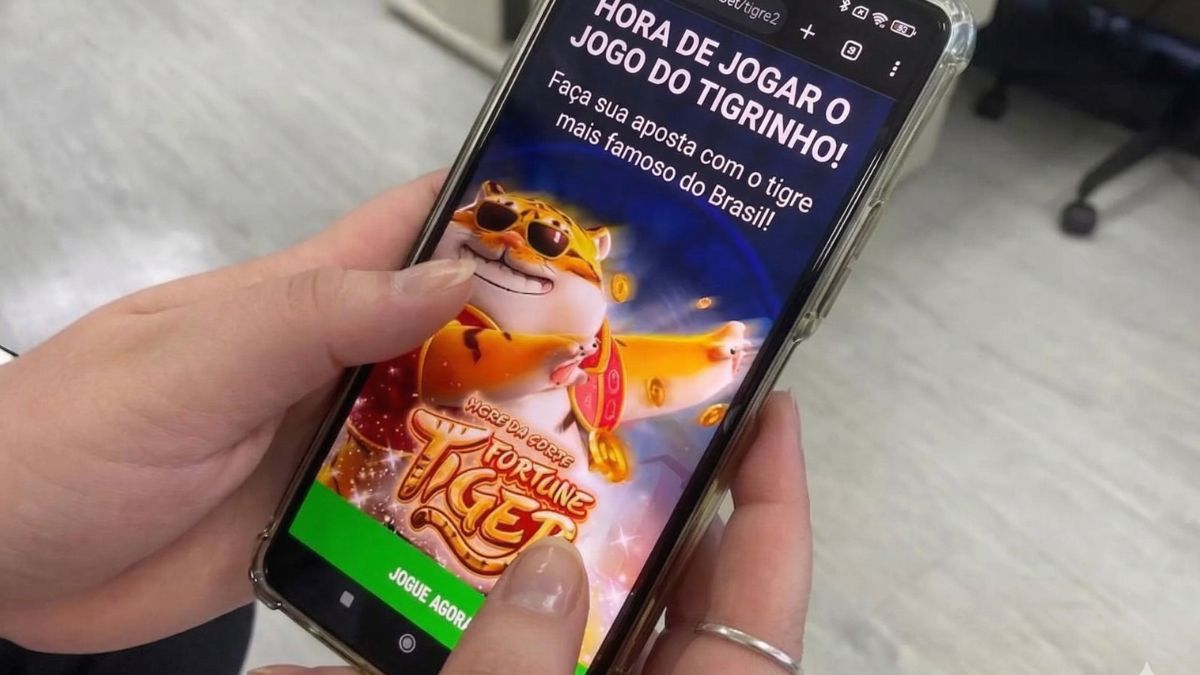 A disseminação do jogo do tigrinho em smartphones motivou a criação de barreiras imediatas no sistema de pagamentos via Pix. Ilustração/IA/Gazeta de S. Paulo