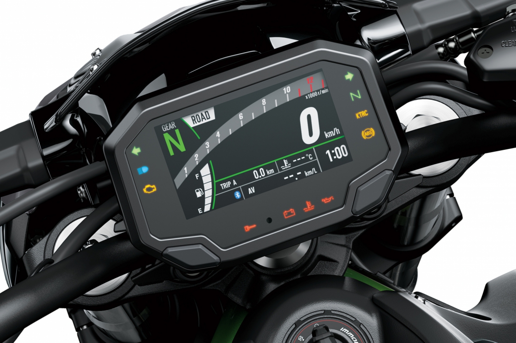 O painel da Z900 vem com informações de velocidade, nível de combustível, relógio, temperatura do líquido de arrefecimento e lembrete de troca de óleo Macaque in the trees