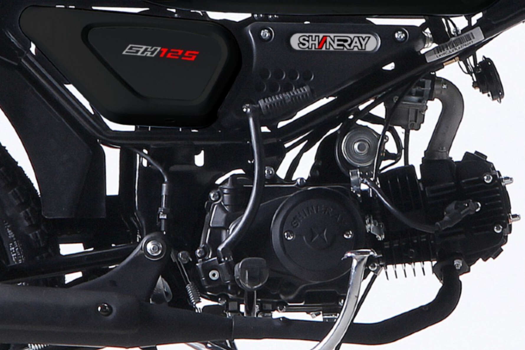 A moto está equipada com motor de um cilindro, 125 cm³, quatro tempos, duas válvulas e eixo de comando acima das válvulas de admissão e o de escapamento, no cabeçote Macaque in the trees